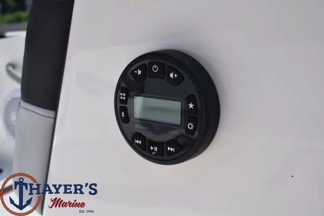 Slide: The Image of Close-up of 2024 Bayliner M15 boat control panel at Thayer's Marine. - 7