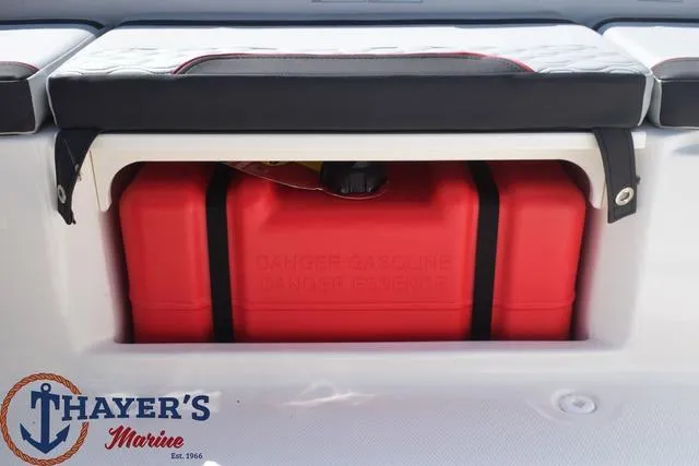 Slide: The Image of 2024 Bayliner M15 boat with red gasoline tank storage compartment. - 8
