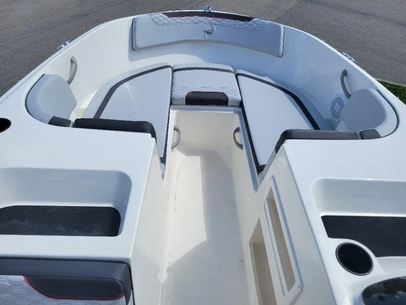 Slide: The Image of 2024 Bayliner M17 boat interior with seating and storage compartments. - 8