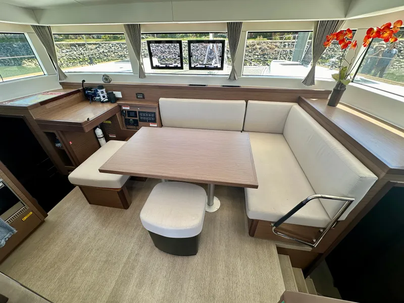 Slide: The Image of Interior of 2020 Lagoon 40 catamaran featuring modern kitchen and dining area. - 37