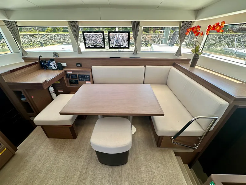 Slide: The Image of Interior of 2020 Lagoon 40 yacht with modern seating and dining area. - 39
