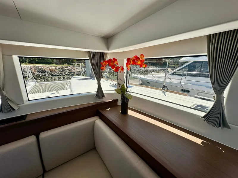 Slide: The Image of Interior of 2020 Lagoon 40 catamaran featuring modern kitchen and dining area. - 40