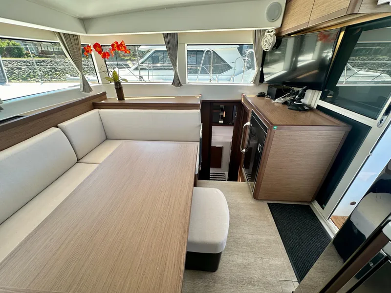 Slide: The Image of Interior of 2020 Lagoon 40 catamaran with modern seating and table arrangement. - 41