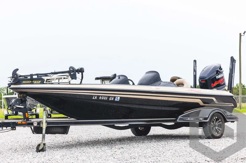 Slide: The Image of 2009 Skeeter ZX 200 fishing boat on trailer, side view. - 1