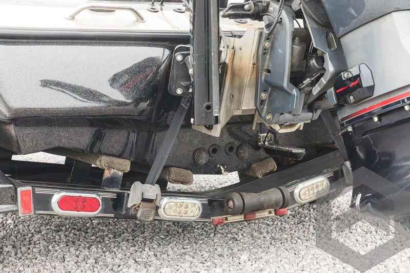 Slide: The Image of 2009 Skeeter ZX 200 boat trailer and motor close-up. - 19