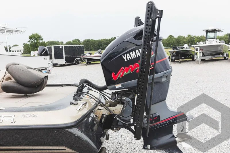 Slide: The Image of 2009 Skeeter ZX 200 with Yamaha VMAX outboard motor in a boatyard. - 22