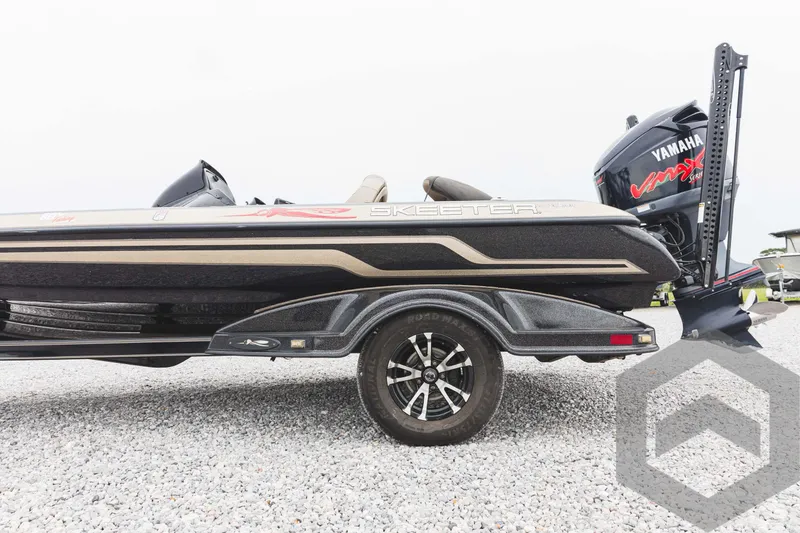 Slide: The Image of 2009 Skeeter ZX 200 bass boat with Yamaha VMAX engine on trailer. - 26