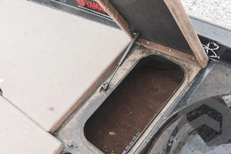 Slide: The Image of Open storage compartment on a 2009 Skeeter ZX 200 boat. - 37