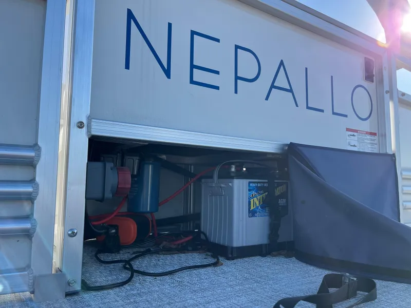 Slide: The Image of Nepallo CW18 2022 model showing battery compartment and wiring details. - 12