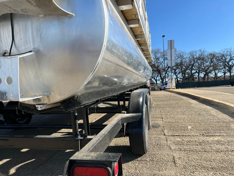 Slide: The Image of Close-up of 2022 Nepallo CW18 boat on trailer, sunny day, roadside view. - 17