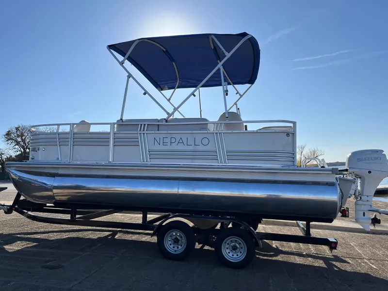 Slide: The Image of 2022 Nepallo CW18 pontoon boat with blue canopy on trailer. - 30