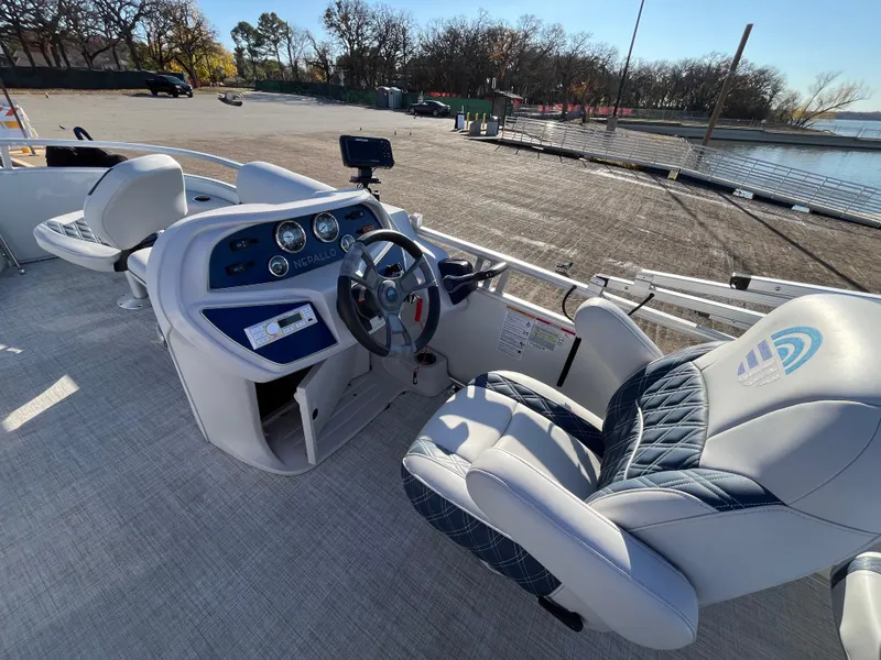 Slide: The Image of 2022 Nepallo CW18 boat interior with steering wheel and comfortable seating. - 38