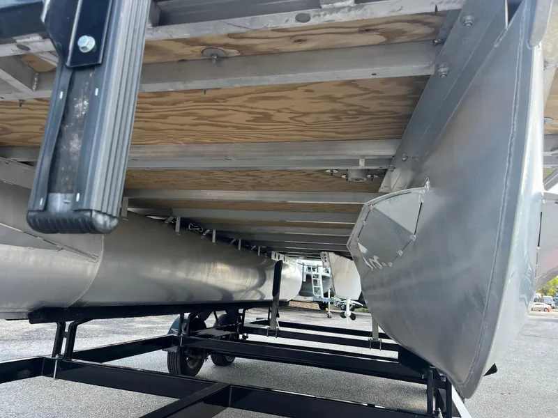 Slide: The Image of Underneath view of a 2022 Nepallo CW18 pontoon boat on a trailer. - 46