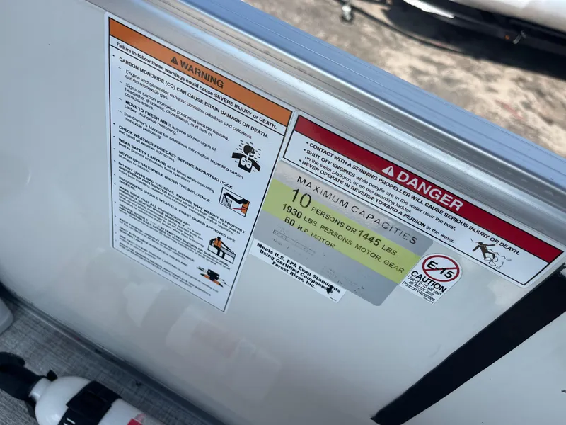 Slide: The Image of Warning and capacity labels on Nepallo CW18, 2022 model, indicating safety instructions and limits. - 55