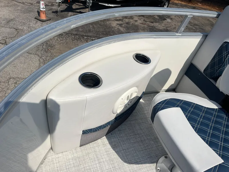Slide: The Image of Nepallo CW18 2022 boat interior with cup holders and cushioned seating. - 56