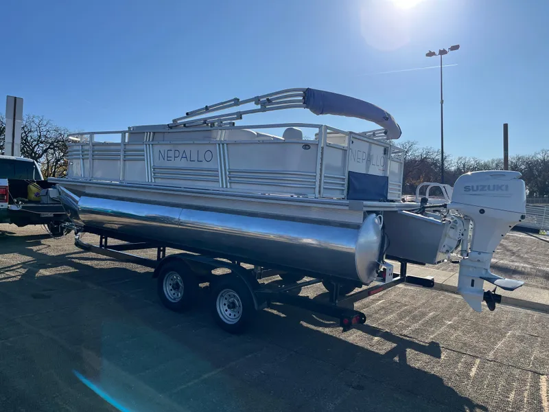 Slide: The Image of 2022 Nepallo CW18 pontoon boat on trailer with Suzuki outboard motor. - 6