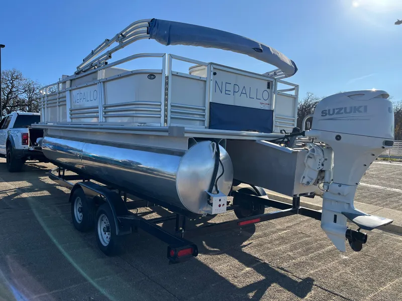 Slide: The Image of 2022 Nepallo CW18 pontoon boat with Suzuki outboard motor on trailer. - 7