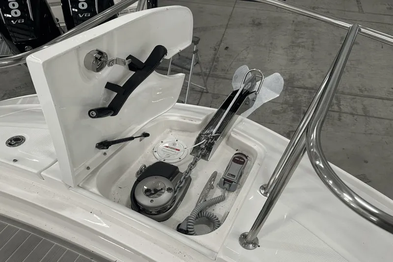 Slide: The Image of Anchor compartment of 2025 Sea Ray Sundancer 320 with winch and stainless steel fittings. - 26