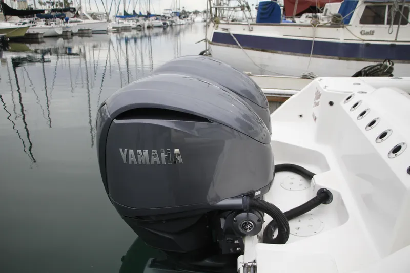 Slide: The Image of 2008 Everglades 270 Center Console with Yamaha outboard engine at marina. - 13
