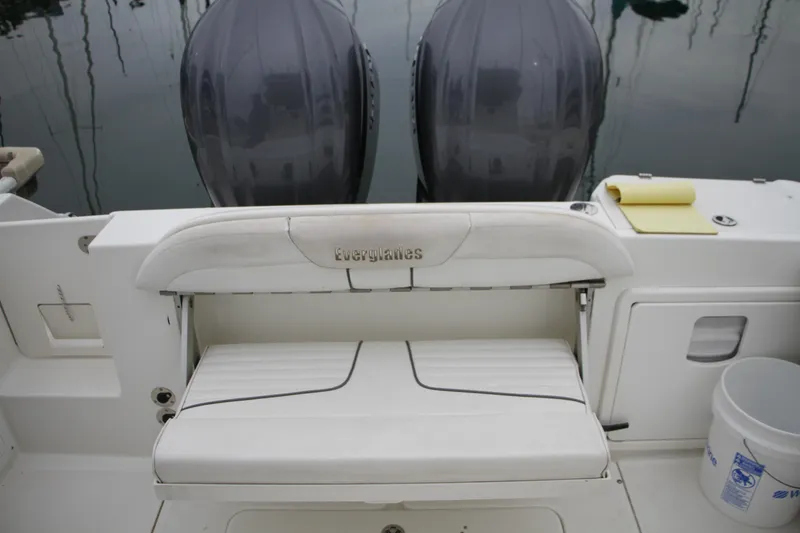 Slide: The Image of 2008 Everglades 270 Center Console boat with dual engines and seating. - 15