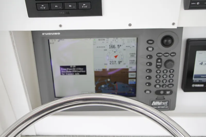 Slide: The Image of Close-up of a 2008 Everglades 270 Center Console navigation system display. - 17