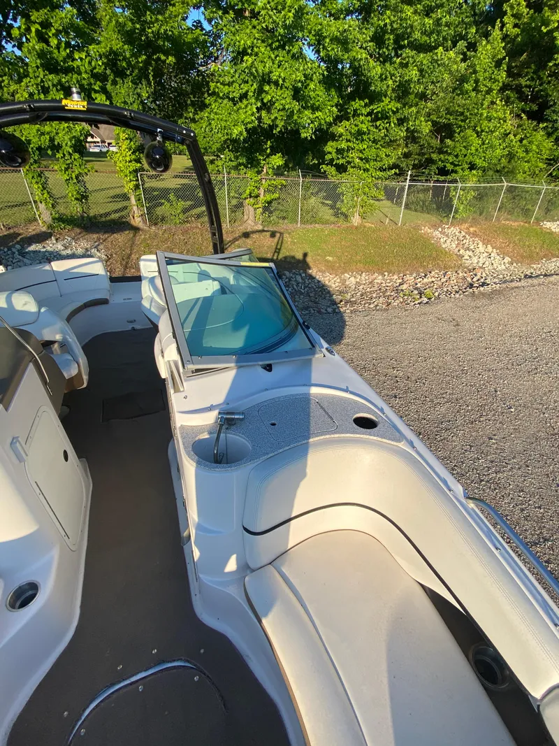 Slide: The Image of 2008 Four Winns F Series F244 boat interior with seating and windshield. - 6