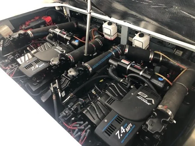 Slide: The Image of Engine compartment of a 2001 Sea Ray 340 Sundancer with twin 7.4 MPI engines. - 16