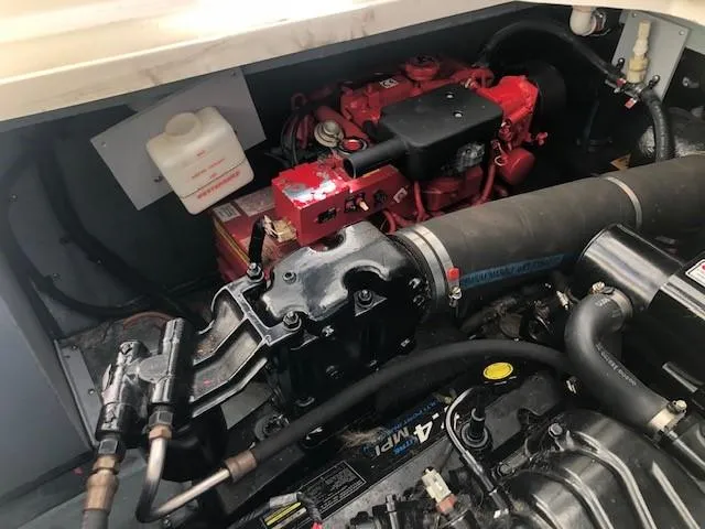 Slide: The Image of Engine compartment of a 2001 Sea Ray 340 Sundancer boat. - 17