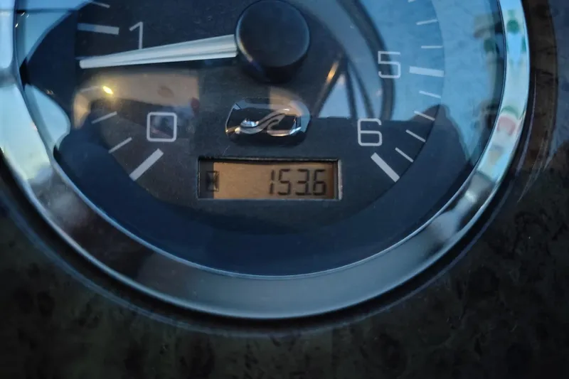 Slide: The Image of Close-up of a 2001 Sea Ray 340 Sundancer tachometer displaying 1536 hours. - 27