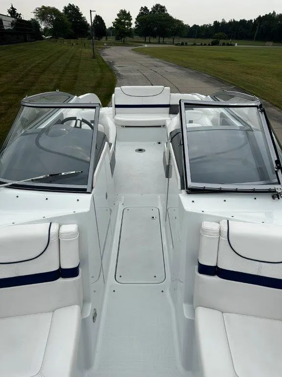 Slide: The Image of 2013 Formula 270 Bowrider boat with open cockpit and seating. - 11