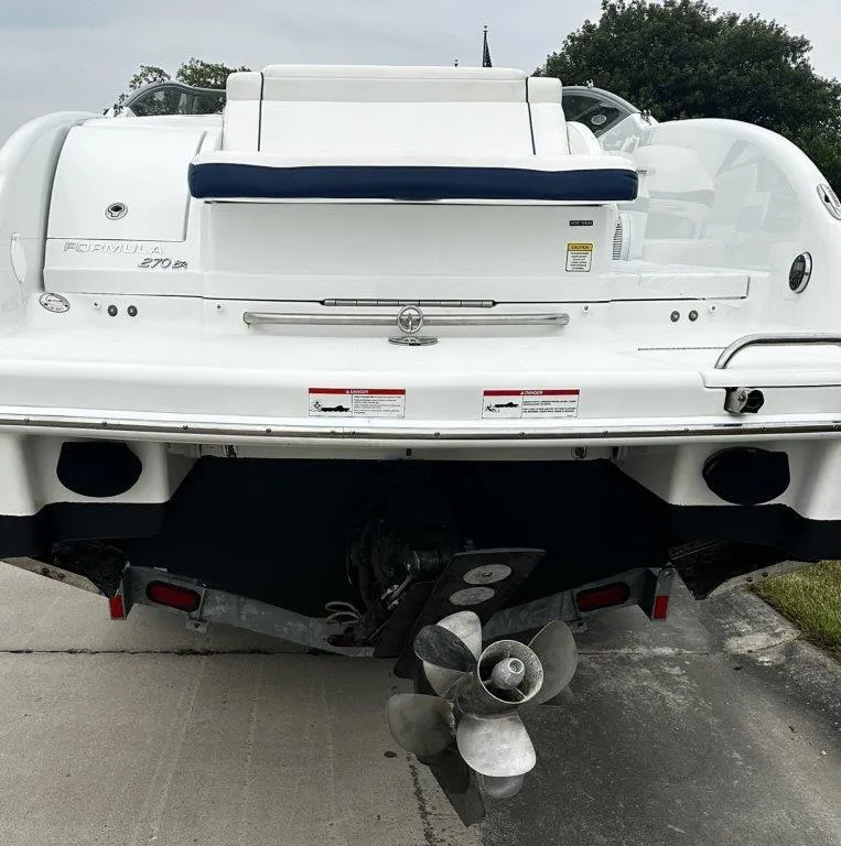 Slide: The Image of 2013 Formula 270 Bowrider boat, rear view with propeller and swim platform. - 17