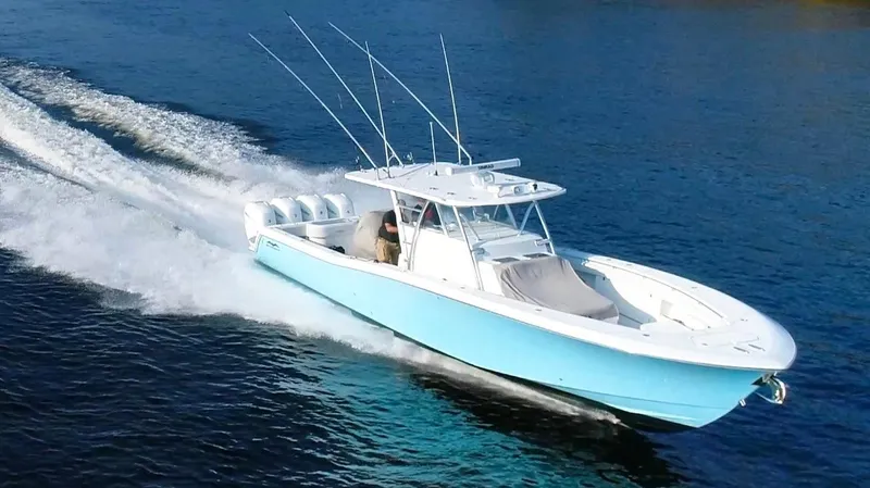 The Image of 2018 Invincible 42 Center Cabin boat in harbor. - 0