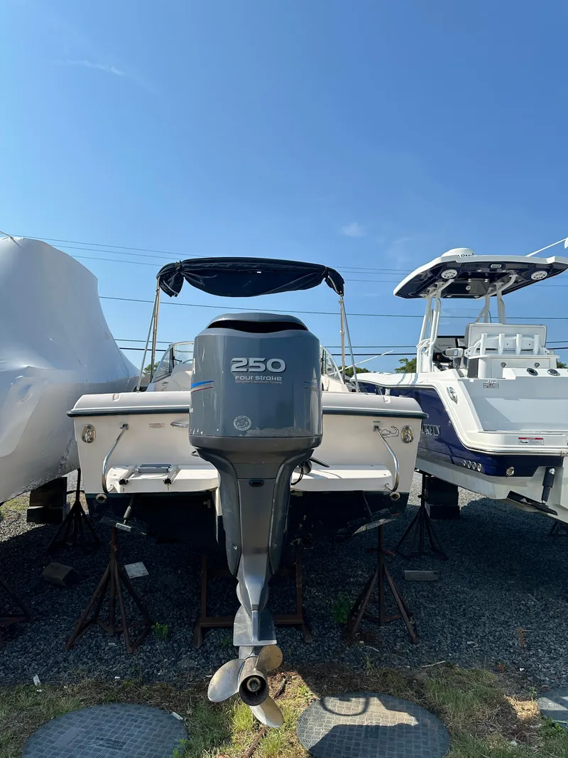 Slide: The Image of 2006 Grady-White 225 Tournament boat with Yamaha 250 outboard motor. - 1