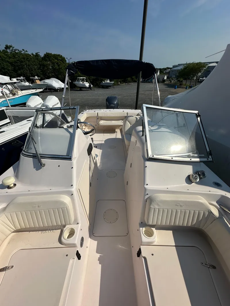 Slide: The Image of 2006 Grady-White 225 Tournament boat with dual consoles and open deck. - 14