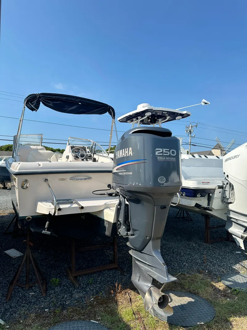 Slide: The Image of 2006 Grady-White 225 Tournament boat with Yamaha 250 outboard motor. - 2