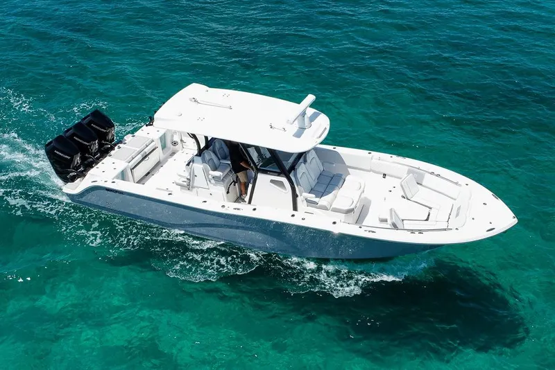 Slide: The Image of 2025 Sea Fox 368 Commander cruising on clear turquoise waters. - 10