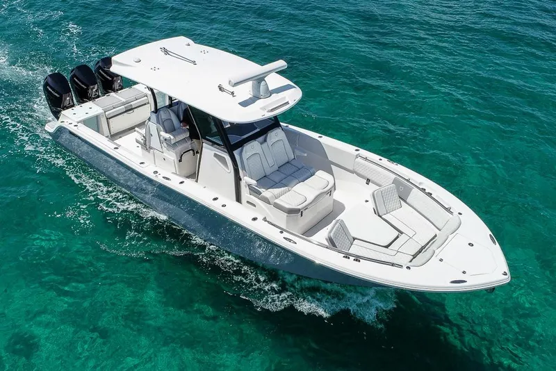 Slide: The Image of 2025 Sea Fox 368 Commander cruising on clear turquoise waters. - 11