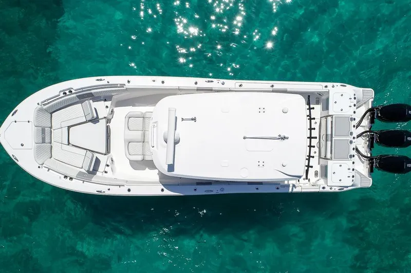 Slide: The Image of Aerial view of 2025 Sea Fox 368 Commander boat on clear turquoise water. - 14