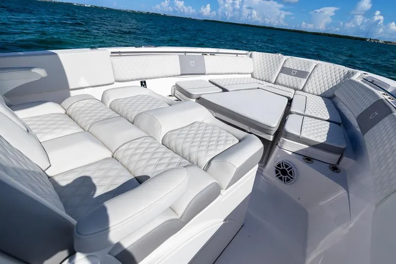 Slide: The Image of Luxurious seating on 2025 Sea Fox 368 Commander boat, featuring elegant quilted upholstery. - 29