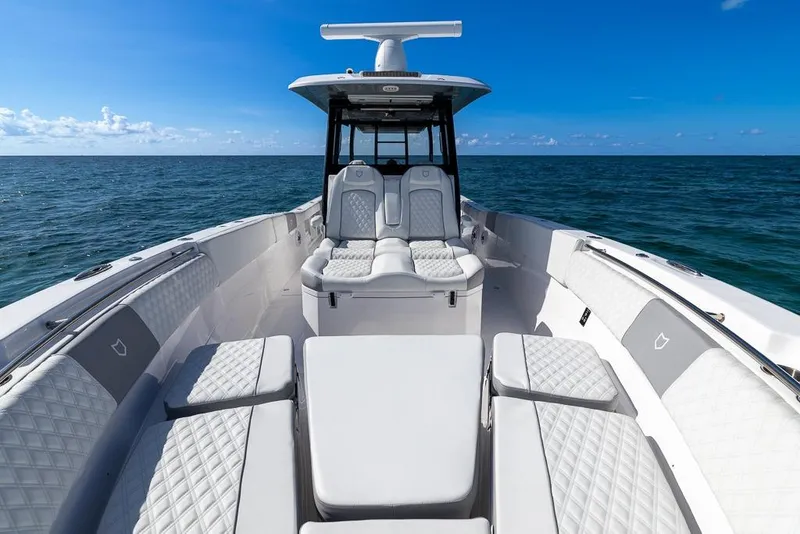 Slide: The Image of 2025 Sea Fox 368 Commander boat interior with luxurious seating on open ocean. - 31