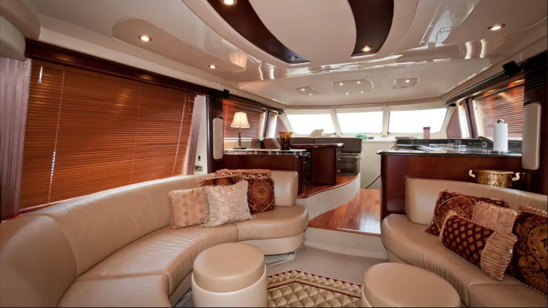 Slide: The Image of Luxurious interior of 2006 Sea Ray 58 Sedan Bridge yacht with elegant seating and wood accents. - 2