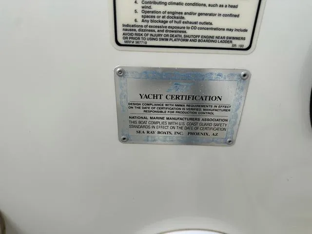 Slide: The Image of Yacht certification plaque on a 1999 Sea Ray 270 Sundancer boat. - 30