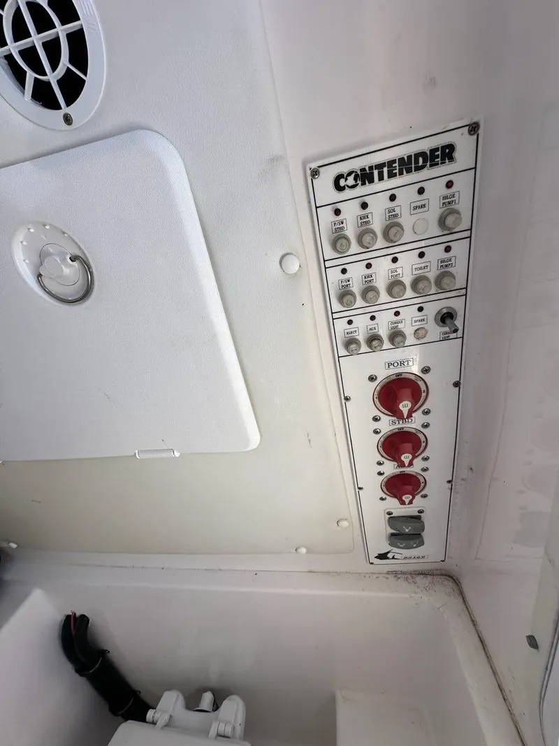Slide: The Image of Control panel of a 2013 Contender 28 Tournament boat. - 10
