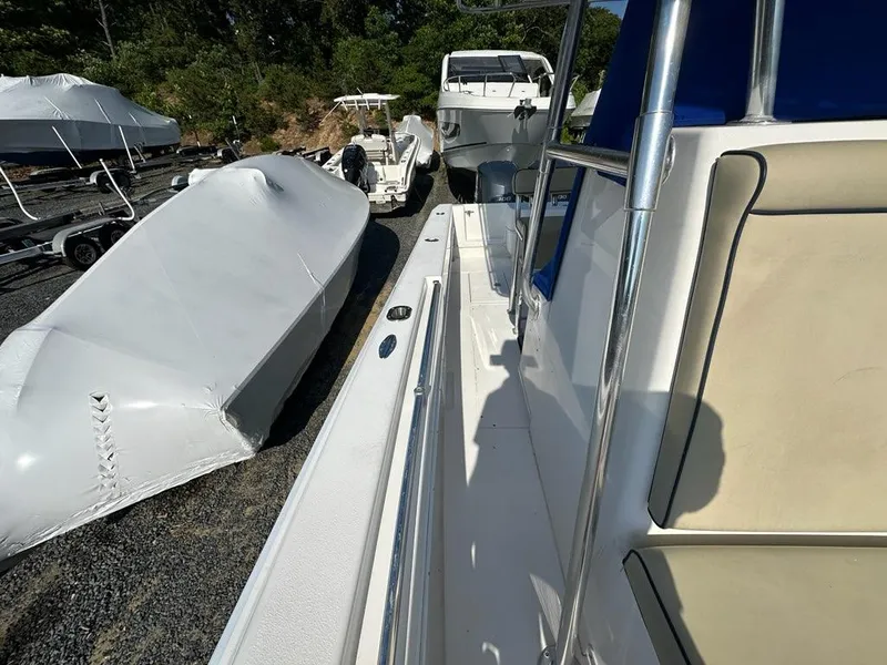 Slide: The Image of 2013 Contender 28 Tournament boat in a marina with other boats. - 12