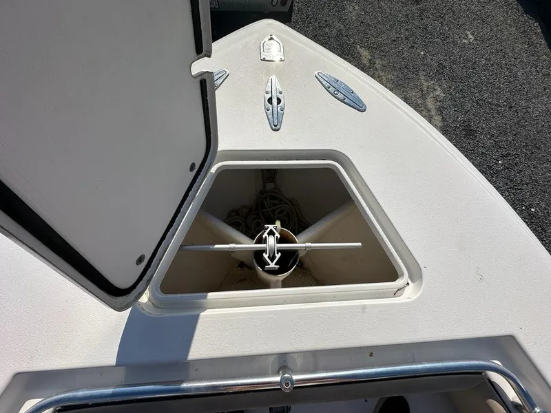 Slide: The Image of Anchor storage compartment on a 2013 Contender 28 Tournament boat. - 14