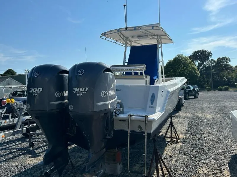 Slide: The Image of 2013 Contender 28 Tournament boat with twin Yamaha 300 V6 engines. - 3