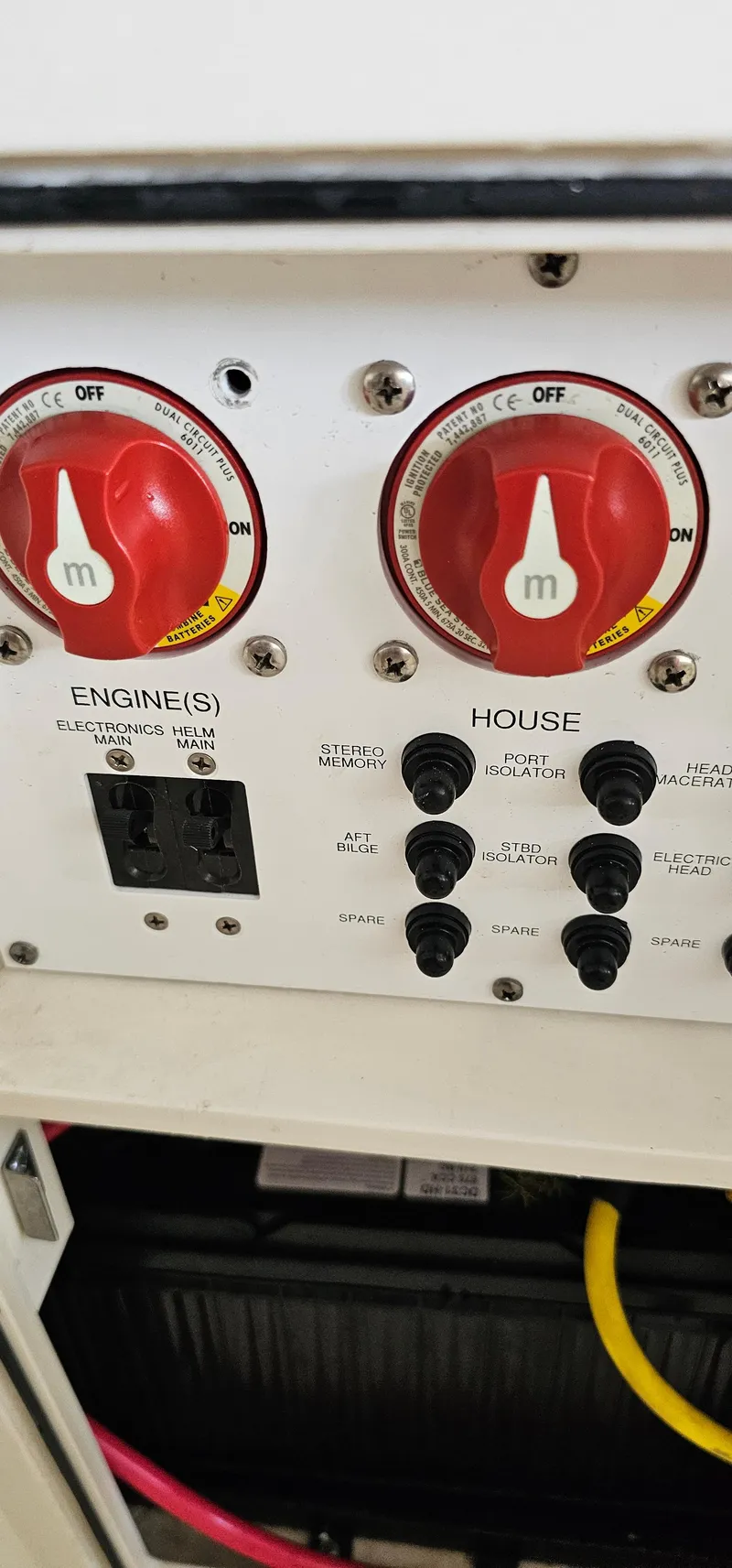 Slide: The Image of 2014 Pursuit C 260 Center Console boat electrical panel with engine and house switches. - 16