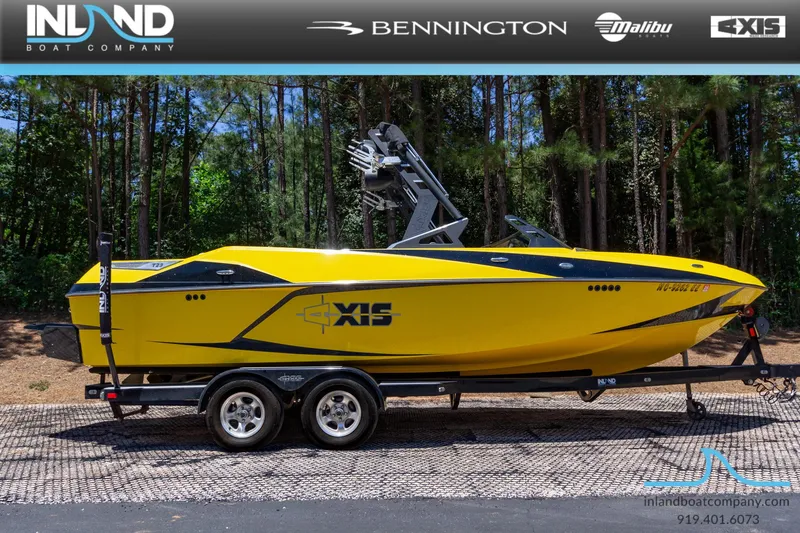 The Image of 2016 Axis T23 yellow boat on trailer, displayed by Inland Boat Company. - 0