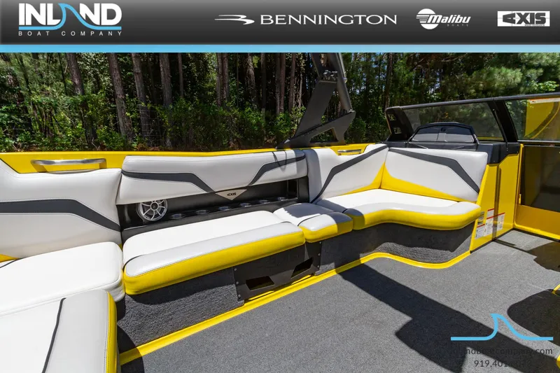 Slide: The Image of 2016 Axis T23 boat interior with yellow and white seating. - 12