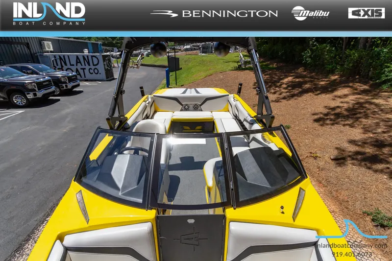 Slide: The Image of 2016 Axis T23 yellow boat at Inland Boat Company dealership. - 15